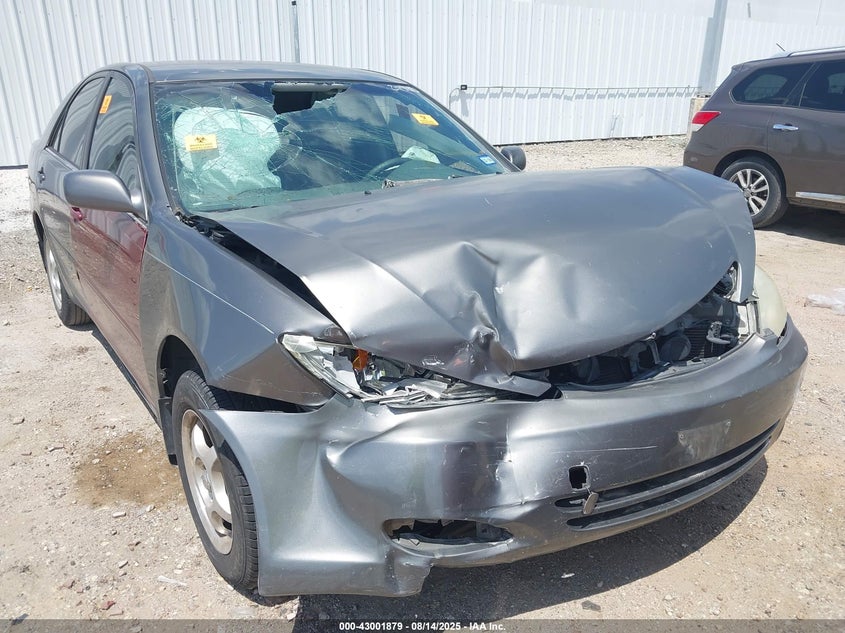 2002 Toyota Camry Le VIN: JTDBE32K320031580 Lot: 43001879