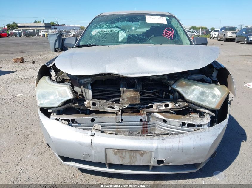 2009 Ford Focus S VIN: 1FAHP34N79W264886 Lot: 43007864