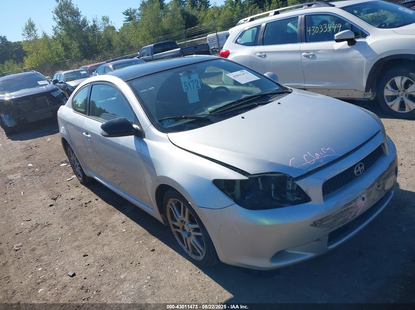 2006 Scion Tc silver coupe gasoline JTKDE177X60106095 photo #1