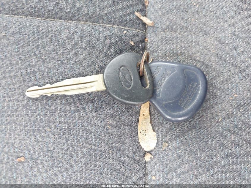 1997 Hyundai Accent Gs/Gt VIN: KMHVD34N1VU252773 Lot: 43013194