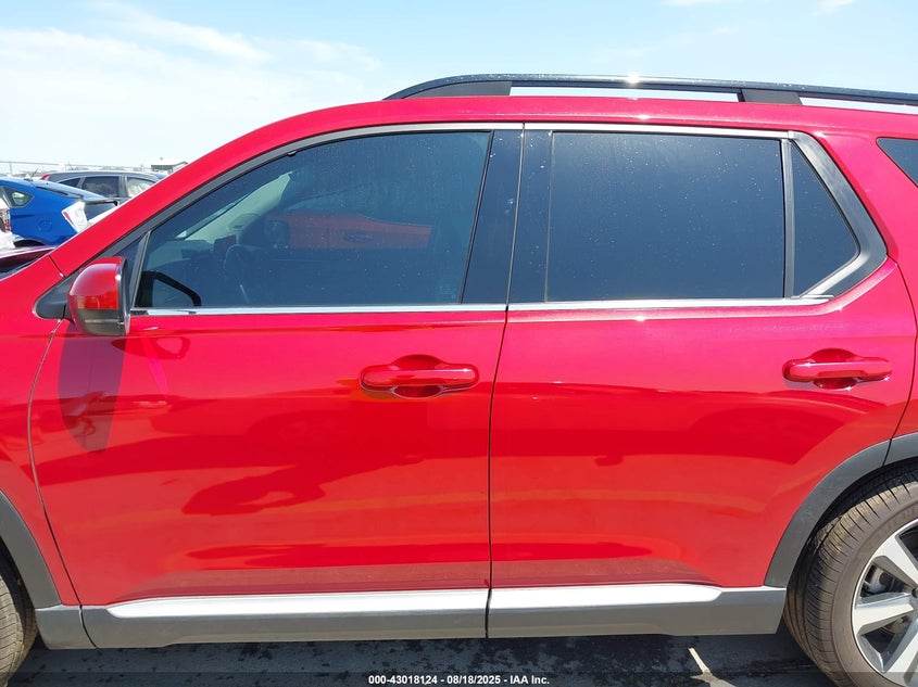 2023 Honda Pilot 2Wd Touring VIN: 5FNYG2H72PB000671 Lot: 43018124