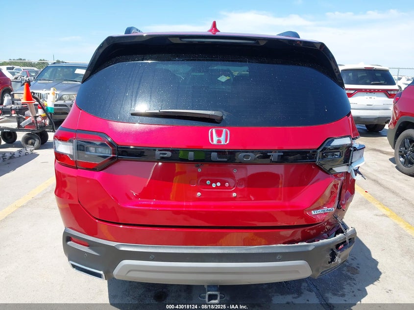 2023 Honda Pilot 2Wd Touring VIN: 5FNYG2H72PB000671 Lot: 43018124