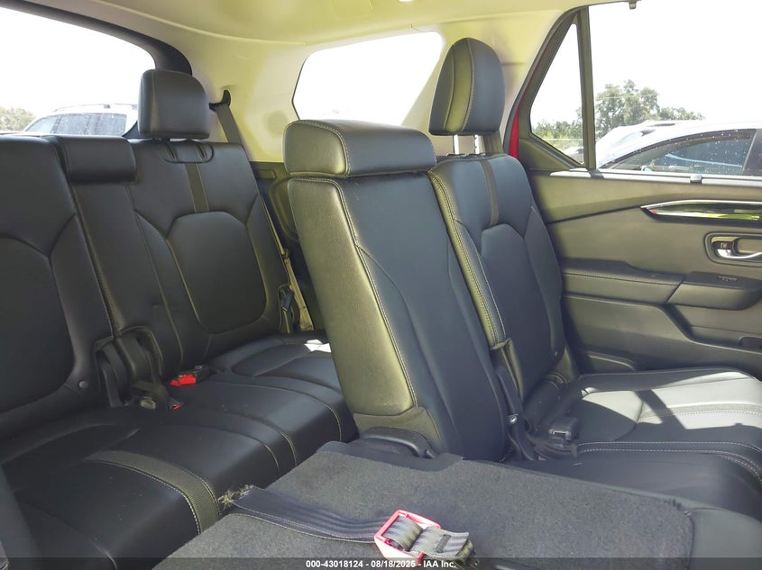 2023 Honda Pilot 2Wd Touring VIN: 5FNYG2H72PB000671 Lot: 43018124