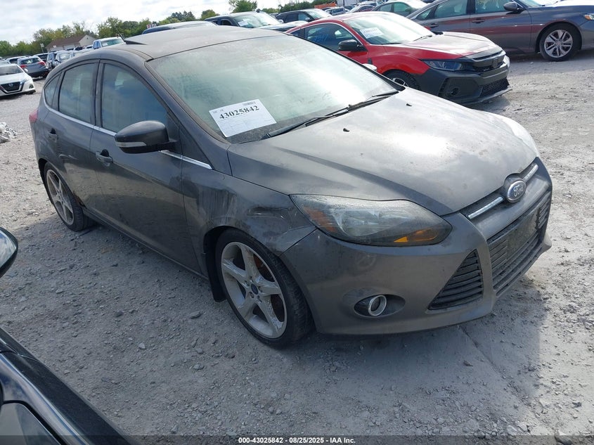 1FAHP3N28CL225592 2012 Ford Focus Titanium auction photo 1