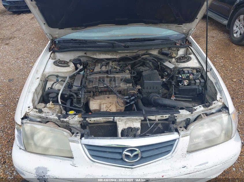 2000 Mazda 626 Es/Lx VIN: 1YVGF22CXY5148732 Lot: 43032644