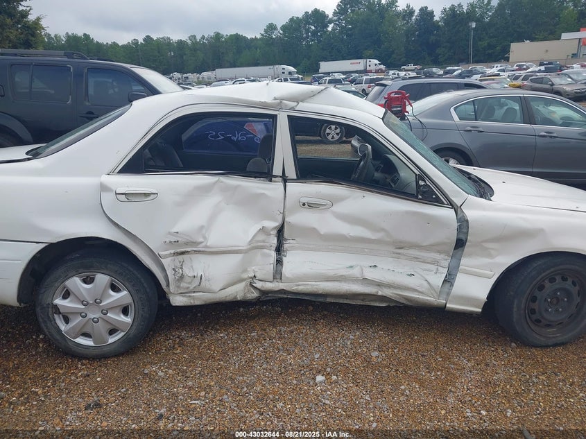 2000 Mazda 626 Es/Lx VIN: 1YVGF22CXY5148732 Lot: 43032644