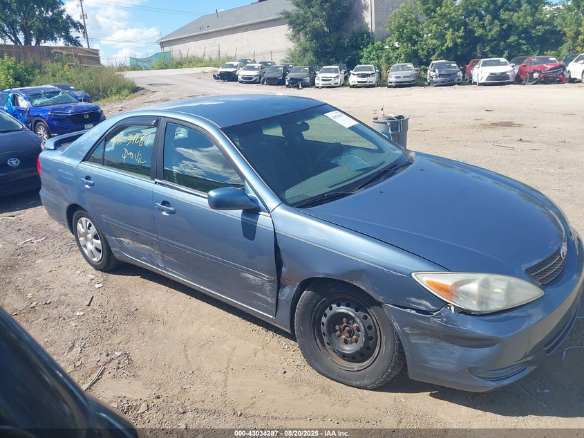 2002 Toyota Camry Le VIN: 4T1BE32K42U612588 Lot: 43034287