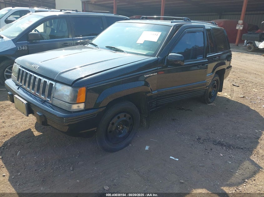 1993 Jeep Grand Cherokee Laredo black suv gasoline 1J4GZ58S3PC130896 photo #3