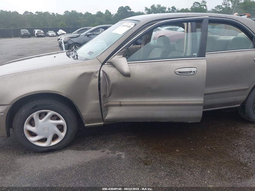 1998 Mazda 626 Dx/Lx VIN: 1YVGF22CXW5736434 Lot: 43049148