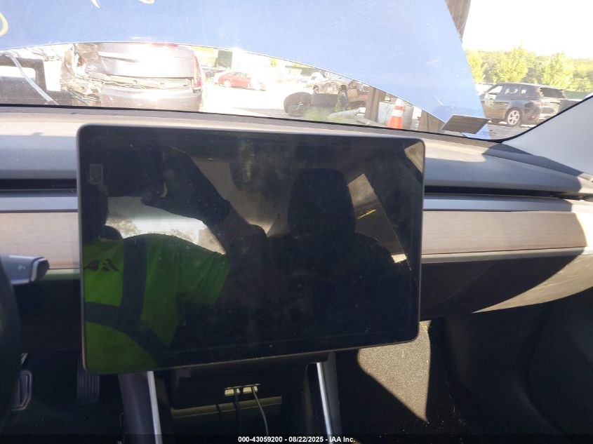 2018 Tesla Model 3 VIN: 5YJ3E1EA3JF027718 Lot: 43059200