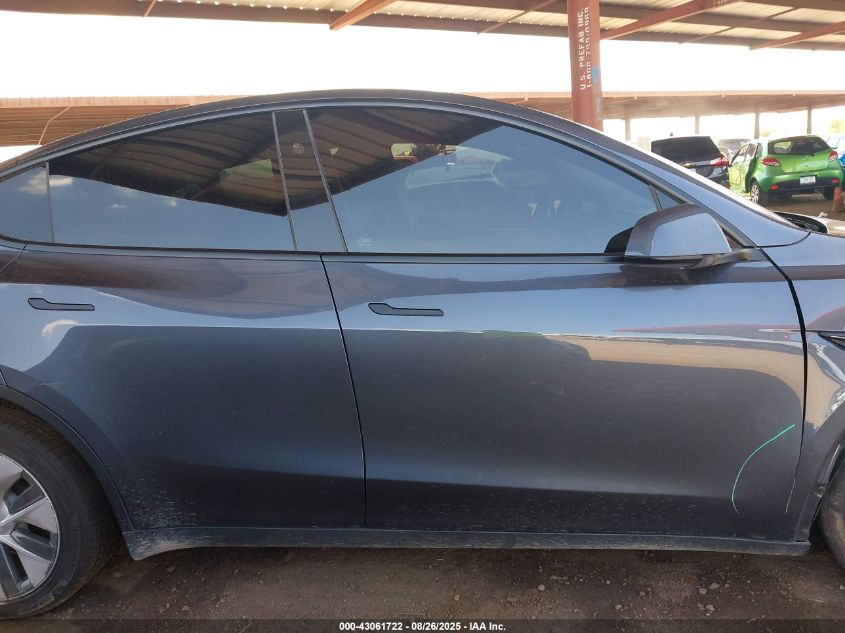 2023 Tesla Model Y Awd/Long Range Dual Motor All-Wheel Drive VIN: 7SAYGDEE3PF812496 Lot: 43061722