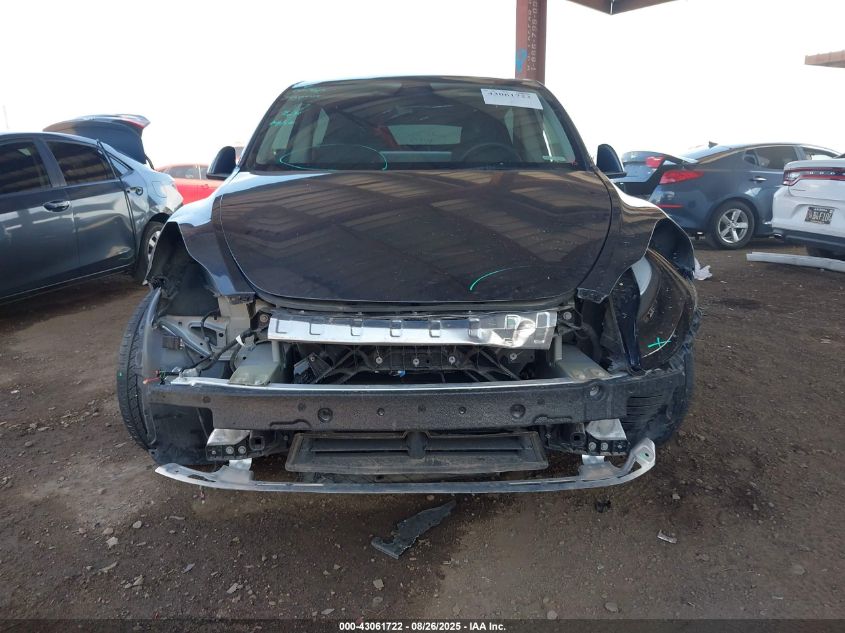 2023 Tesla Model Y Awd/Long Range Dual Motor All-Wheel Drive VIN: 7SAYGDEE3PF812496 Lot: 43061722