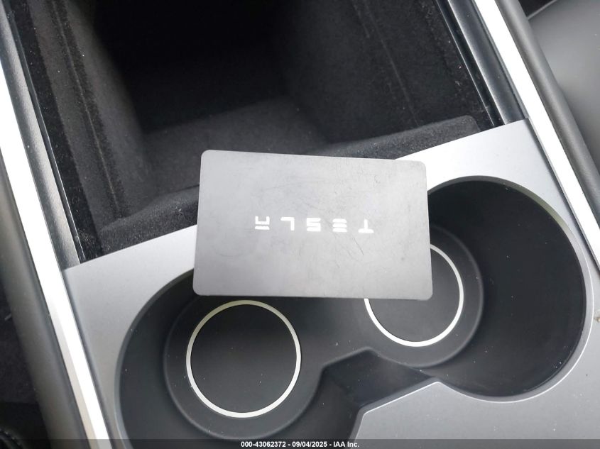 2023 Tesla Model Y Awd/Long Range Dual Motor All-Wheel Drive VIN: 7SAYGDEE4PA083826 Lot: 43062372