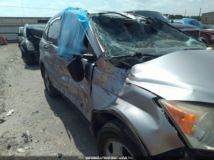 2007 Honda Cr-V Lx VIN: JHLRE38337C025673 Lot: 43066320