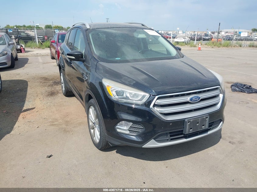 1FMCU9J95HUC11598 2017 Ford Escape Titanium auction photo 1