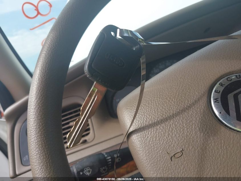 2005 Mercury Grand Marquis Gs VIN: 2MEFM74W25X666838 Lot: 43078156