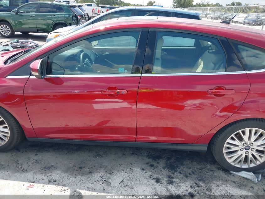 2016 Ford Focus Titanium VIN: 1FADP3N22GL329872 Lot: 43084615