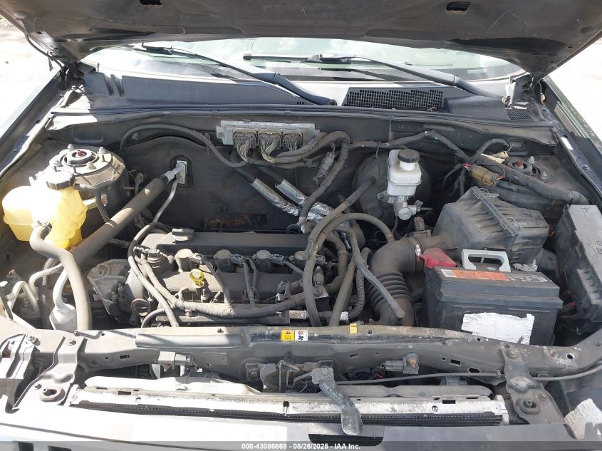 2009 Mercury Mariner I4 VIN: 4M2CU91719KJ00606 Lot: 43086669