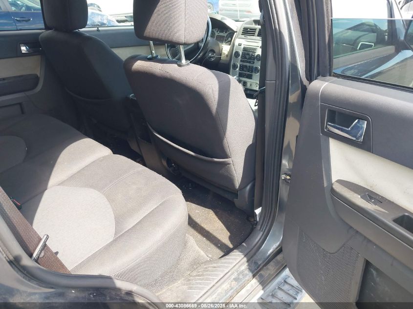 2009 Mercury Mariner I4 VIN: 4M2CU91719KJ00606 Lot: 43086669