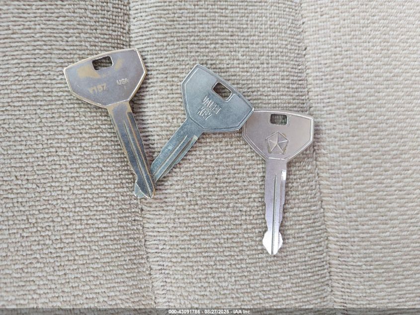 1992 Dodge Spirit VIN: 3B3XA4637NT215679 Lot: 43091786