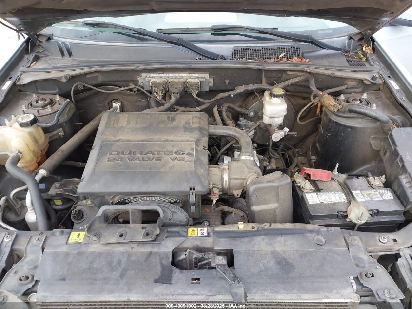 2009 Mercury Mariner Premier V6 VIN: 4M2CU87G79KJ02992 Lot: 43091902