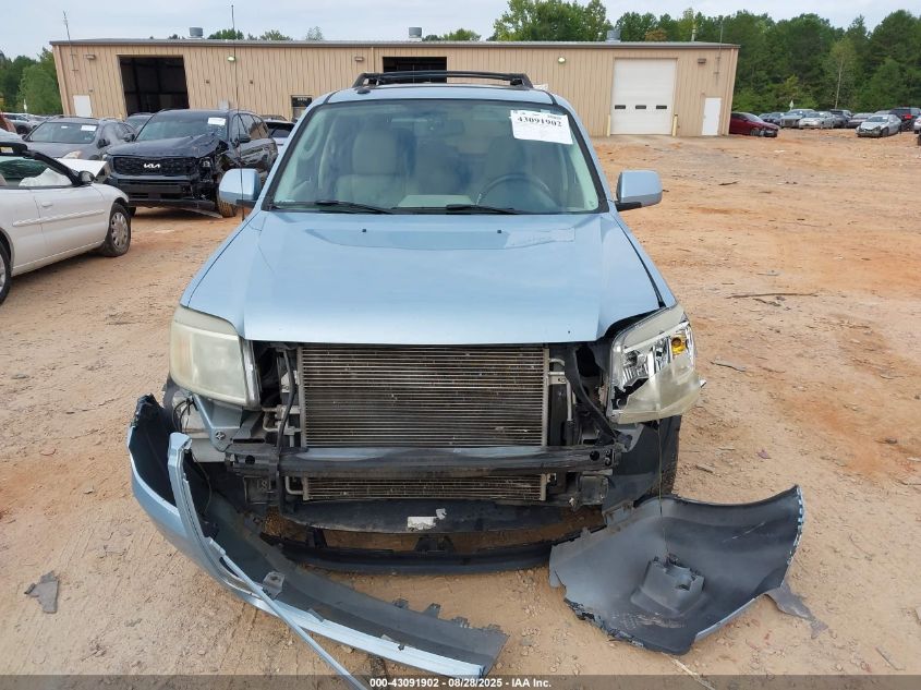 2009 Mercury Mariner Premier V6 VIN: 4M2CU87G79KJ02992 Lot: 43091902