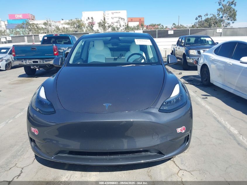 2023 Tesla Model Y Awd/Long Range Dual Motor All-Wheel Drive VIN: 7SAYGDEE5PF877835 Lot: 43096683