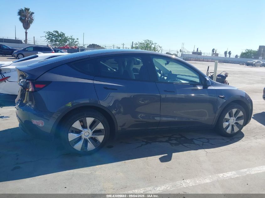 2023 Tesla Model Y Awd/Long Range Dual Motor All-Wheel Drive VIN: 7SAYGDEE5PF877835 Lot: 43096683