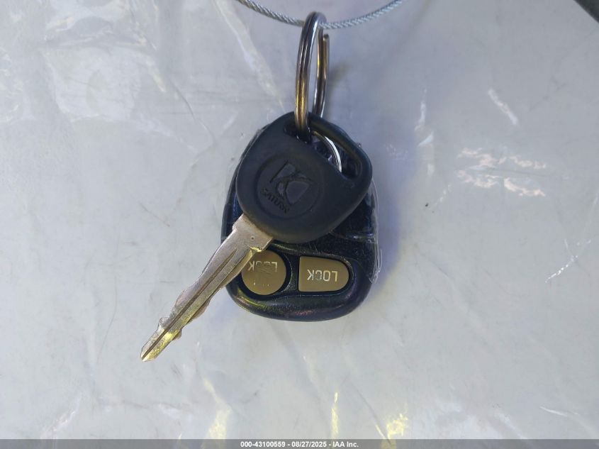 2000 Saturn Sl1 VIN: 1G8ZH5284YZ108445 Lot: 43100559