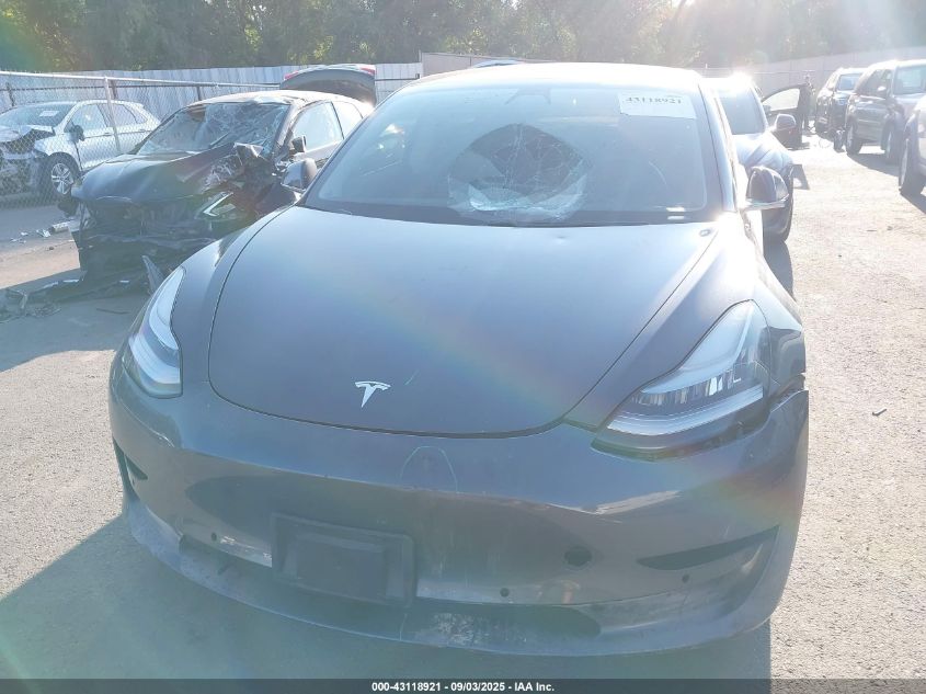 2018 Tesla Model 3 Long Range/Performance VIN: 5YJ3E1EB0JF086945 Lot: 43118921