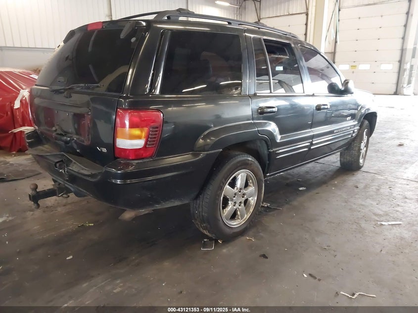 1J8GW58N44C247335 2004 JEEP GRAND CHEROKEE photo no. 4