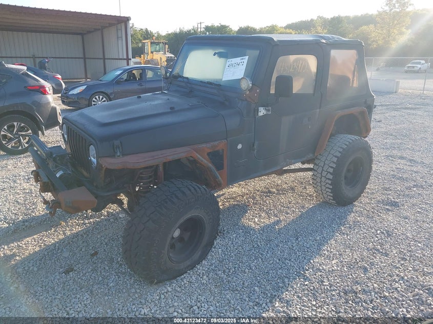 2002 Jeep Wrangler X black other gasoline 1J4FA39S62P743974 photo #3
