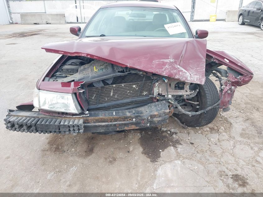 2004 Mercury Grand Marquis Gs VIN: 2MEFM74W14X695519 Lot: 43124054