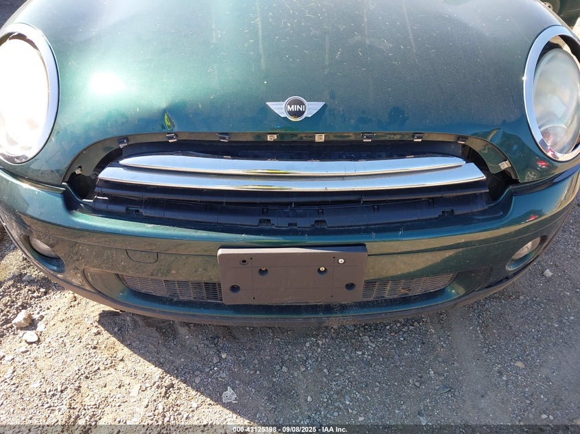 2009 Mini Cooper VIN: WMWMF33599TW75377 Lot: 43125398