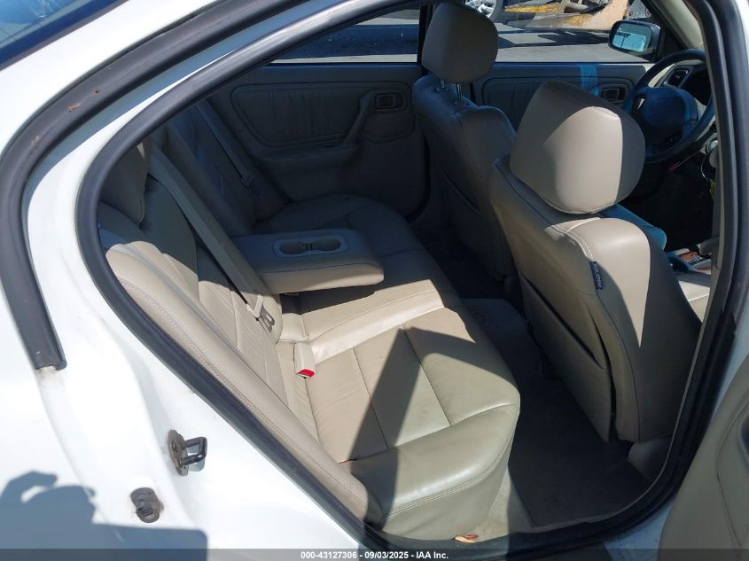 2000 Infiniti G20 Luxury/Touring VIN: JNKCP11A7YT301329 Lot: 43127306