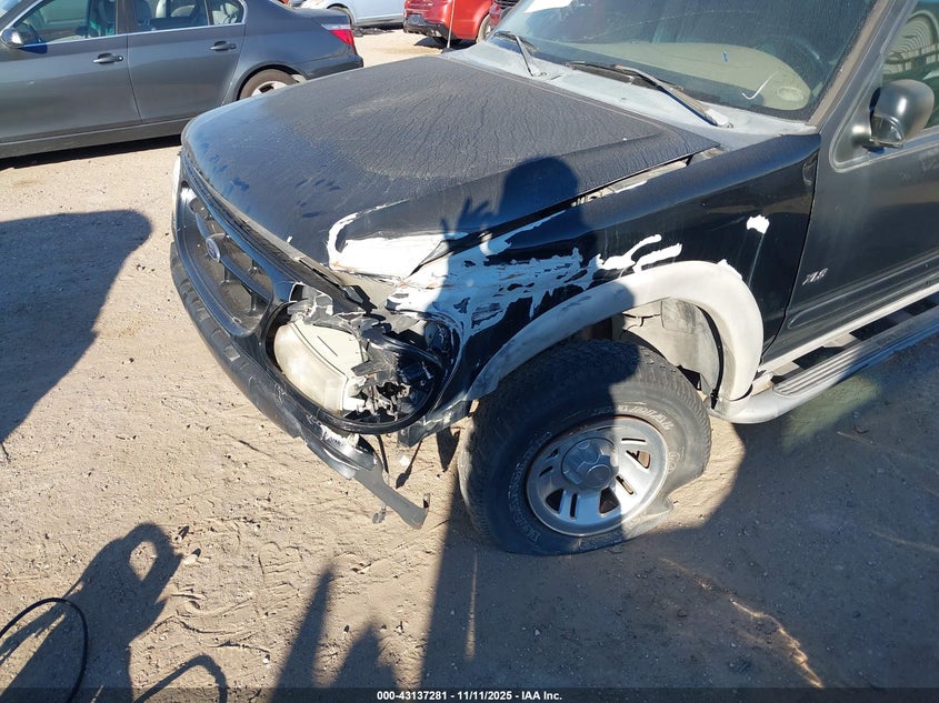 2000 Ford Explorer Xls VIN: 1FMDU62XXYZA97309 Lot: 43137281