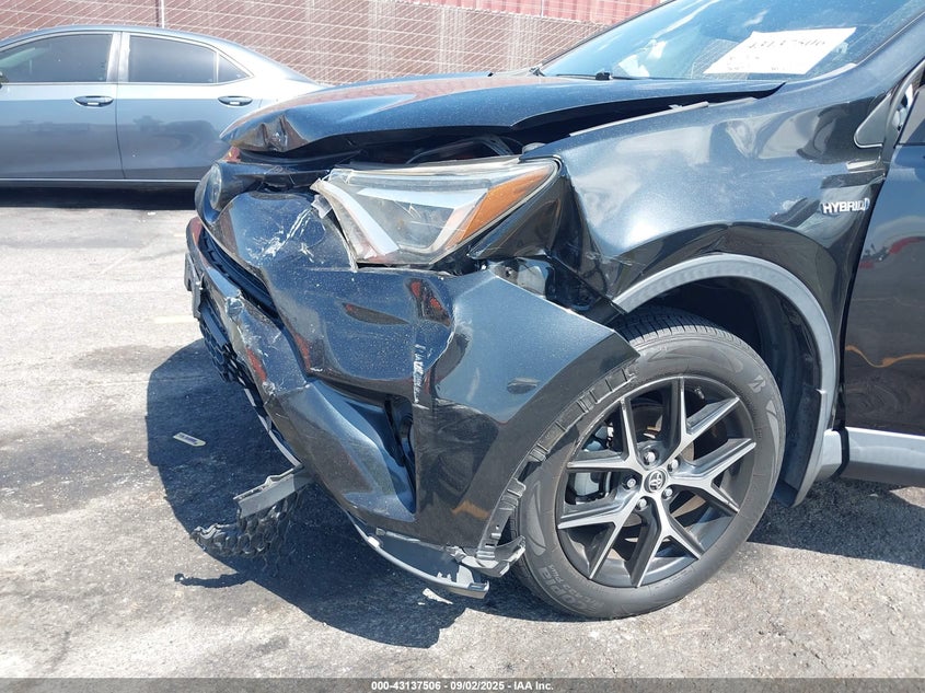2018 TOYOTA RAV4 HYBRID SE - JTMJJREV1JD209705