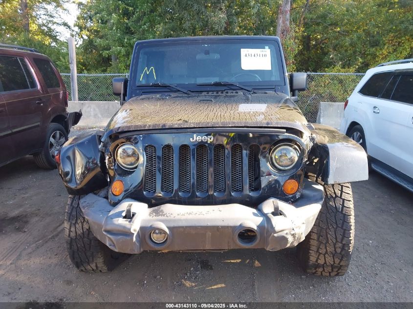 2007 Jeep Wrangler Unlimited Sahara VIN: 1J8GA59167L207644 Lot: 43143110