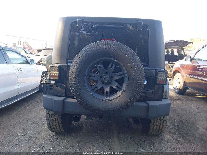 2007 Jeep Wrangler Unlimited Sahara VIN: 1J8GA59167L207644 Lot: 43143110