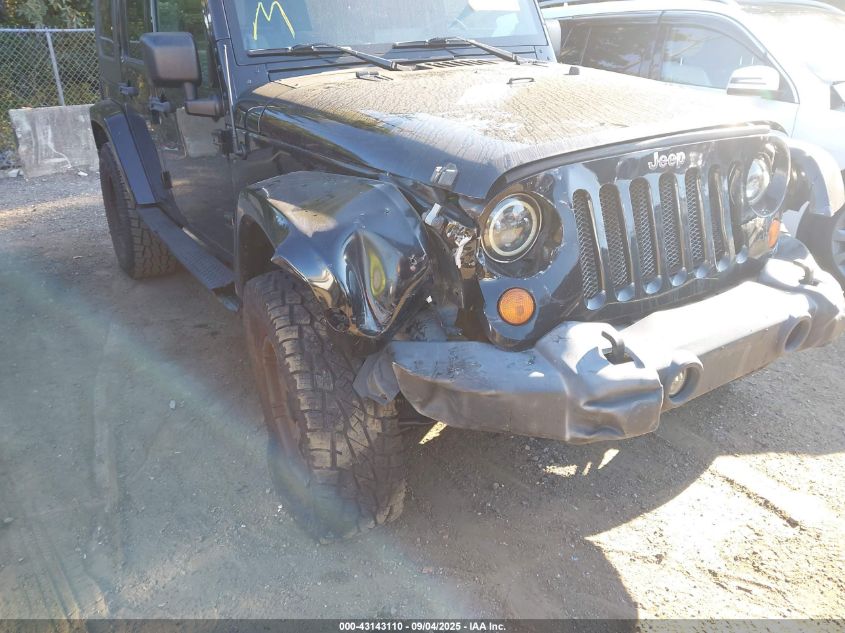 2007 Jeep Wrangler Unlimited Sahara VIN: 1J8GA59167L207644 Lot: 43143110