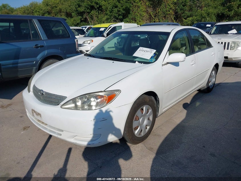 2003 Toyota Camry Le white sedan gasoline JTDBE32K530179960 photo #3