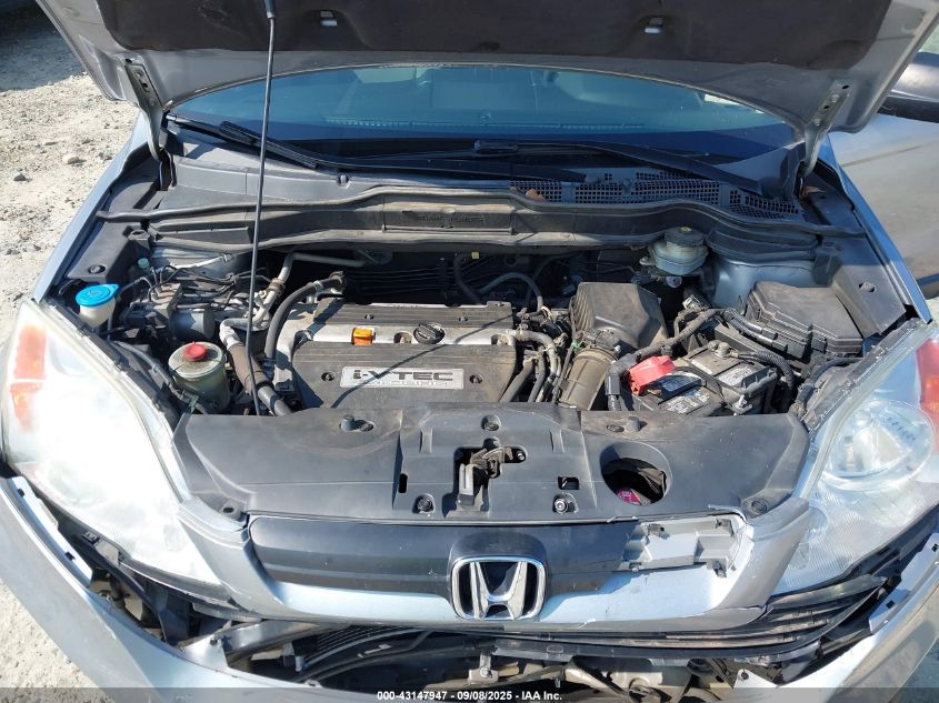 2007 Honda Cr-V Lx VIN: 5J6RE38357L002127 Lot: 43147947