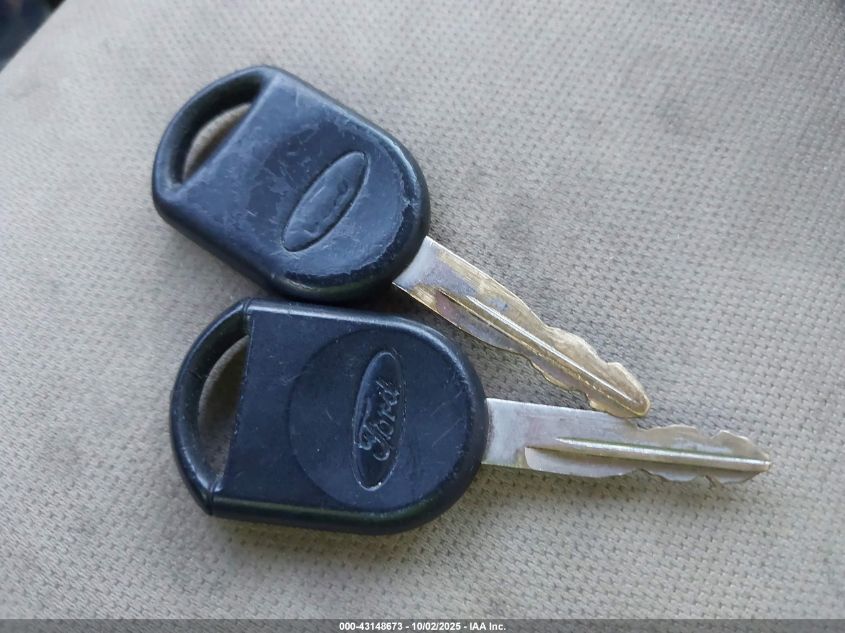 2008 Ford Focus S VIN: 1FAHP34NX8W194587 Lot: 43148673