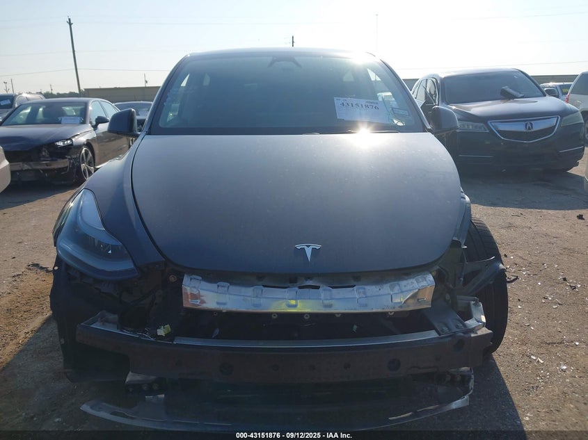 2024 Tesla Model Y Long Range Dual Motor All-Wheel Drive VIN: 7SAYGDEE0RA234017 Lot: 43151876