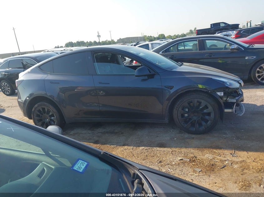 2024 Tesla Model Y Long Range Dual Motor All-Wheel Drive VIN: 7SAYGDEE0RA234017 Lot: 43151876