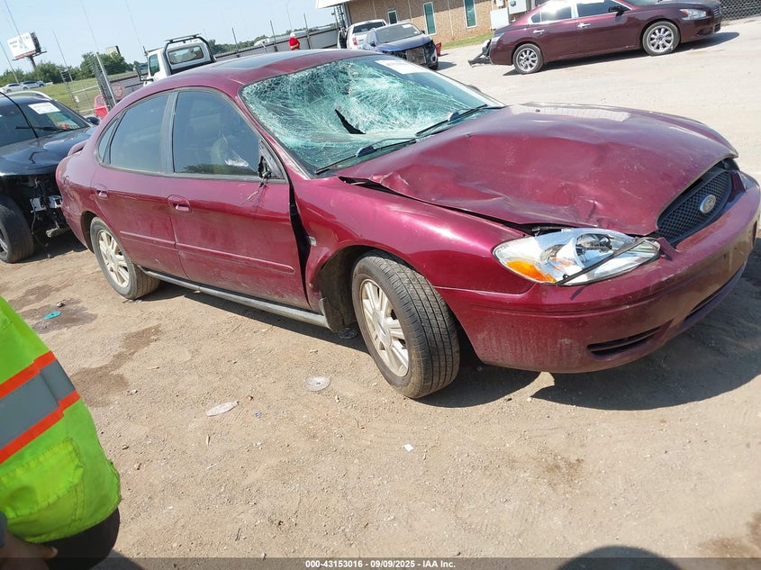 2005 Ford Taurus Sel brown sedan gasoline 1FAHP56S75A182789 photo #1
