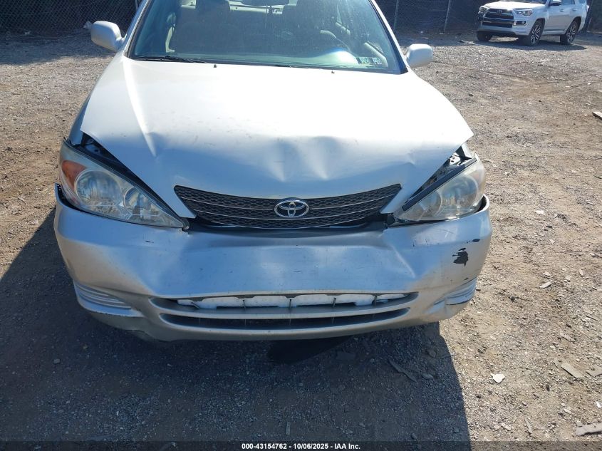 2003 Toyota Camry Le VIN: 4T1BE32K03U736360 Lot: 43154762