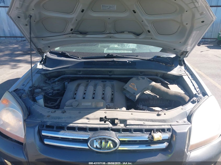 2007 Kia Sportage VIN: KNDJE723277299935 Lot: 43157135