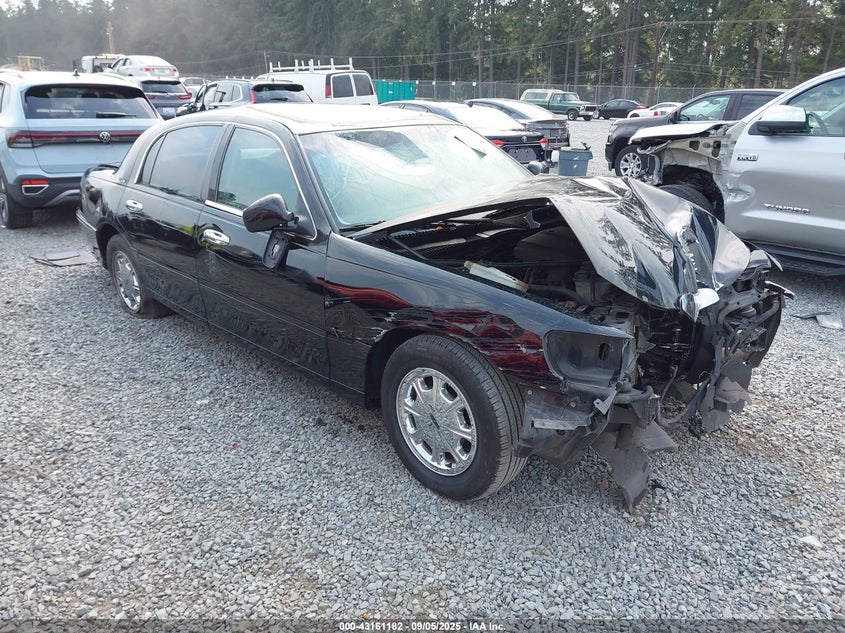 1998 Lincoln Town Car Signature black sedan gasoline 1LNFM82W6WY656238 photo #1
