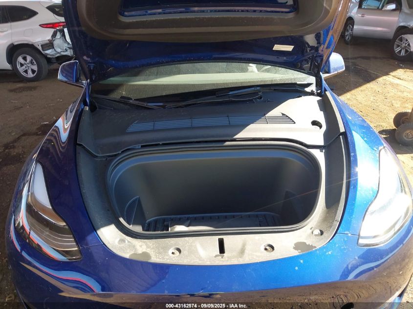 2023 Tesla Model Y VIN: 7SAYGDEE2PA135339 Lot: 43162574